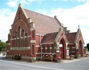 Chapel suffering from water penetration resulting in damp areas on internal walls